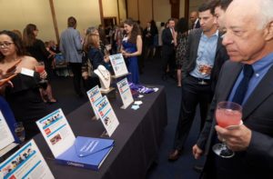 Gala guests consider silent auction items.