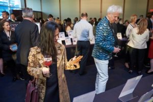 Gala guests consider silent auction items.
