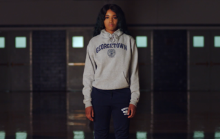 Mariama Barry, in a Georgetown sweater, looks at the camera