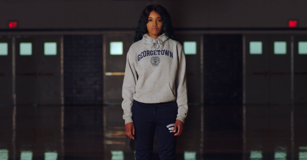 Mariama Barry, in a Georgetown sweater, looks at the camera
