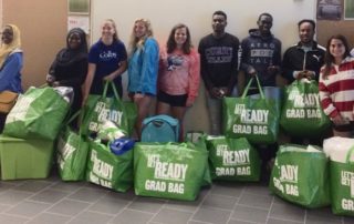 Students at the Maine Transition Day pose with their Grad Bag supplies.